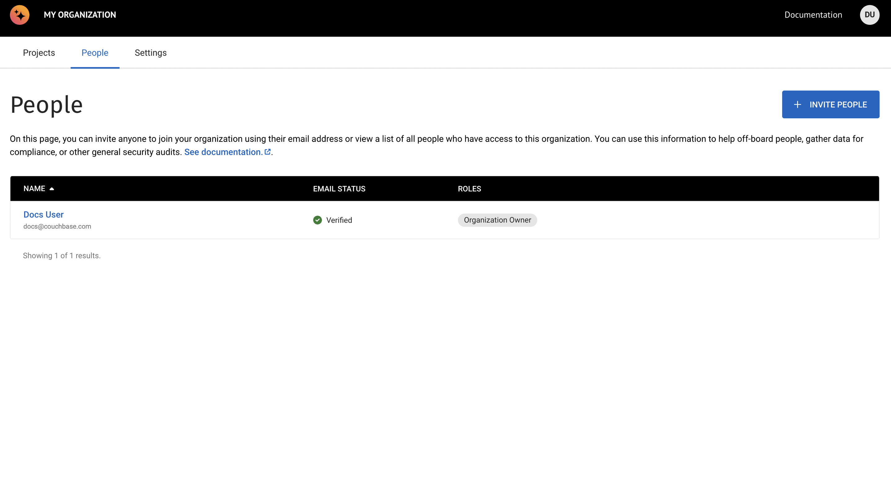 The 'Users' tab showing a table of multiple users, including both Couchbase Capella users and Cluster users, some with a Status of Verified and some with a status of Pending.